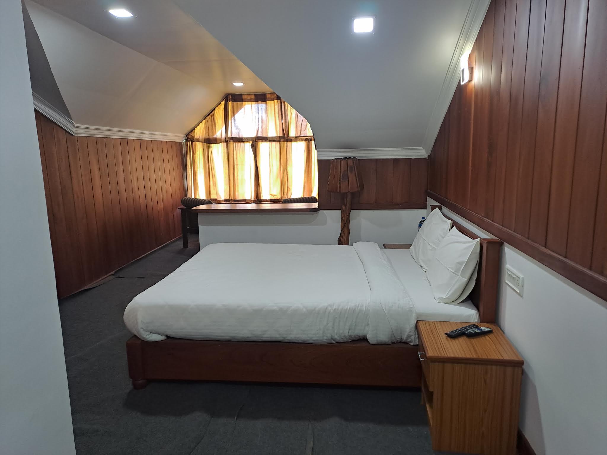 Bed with peaked A-frame window